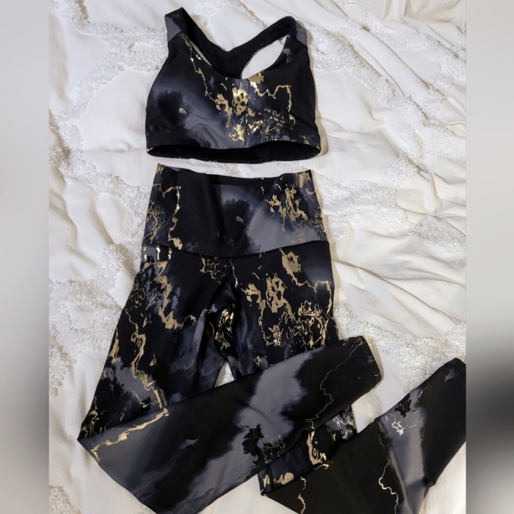 ON black and gold xs leggings and s sports bra